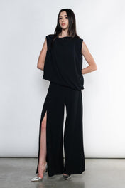 PANTALONI AMPI CON SPACCO