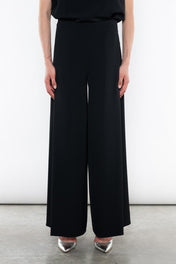 PANTALONI AMPI CON SPACCO