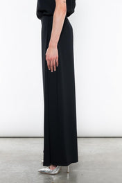 PANTALONI AMPI CON SPACCO