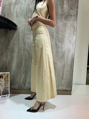 Pantaloni crema a zampa