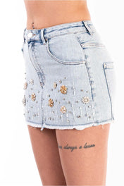 Gonna denim con applicazioni