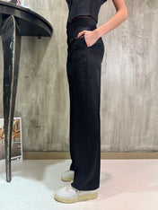 Pantaloni in raso a zampa
