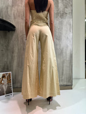 Pantaloni crema a zampa