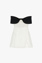 Mini abito con scollo alla Bardot, fiocco e cut-out