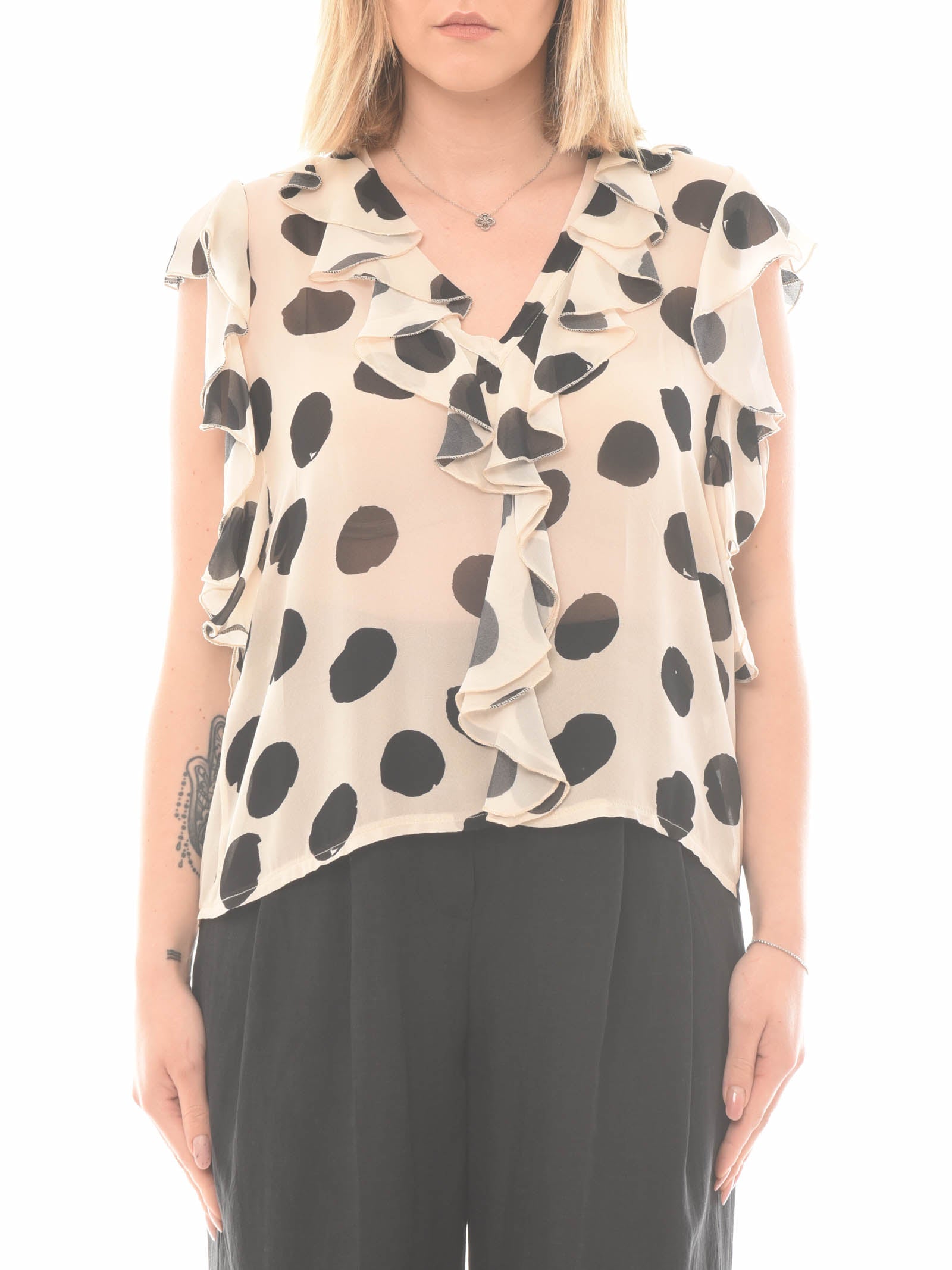 Blusa a pois
