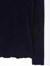 Maglia dolcevita a coste