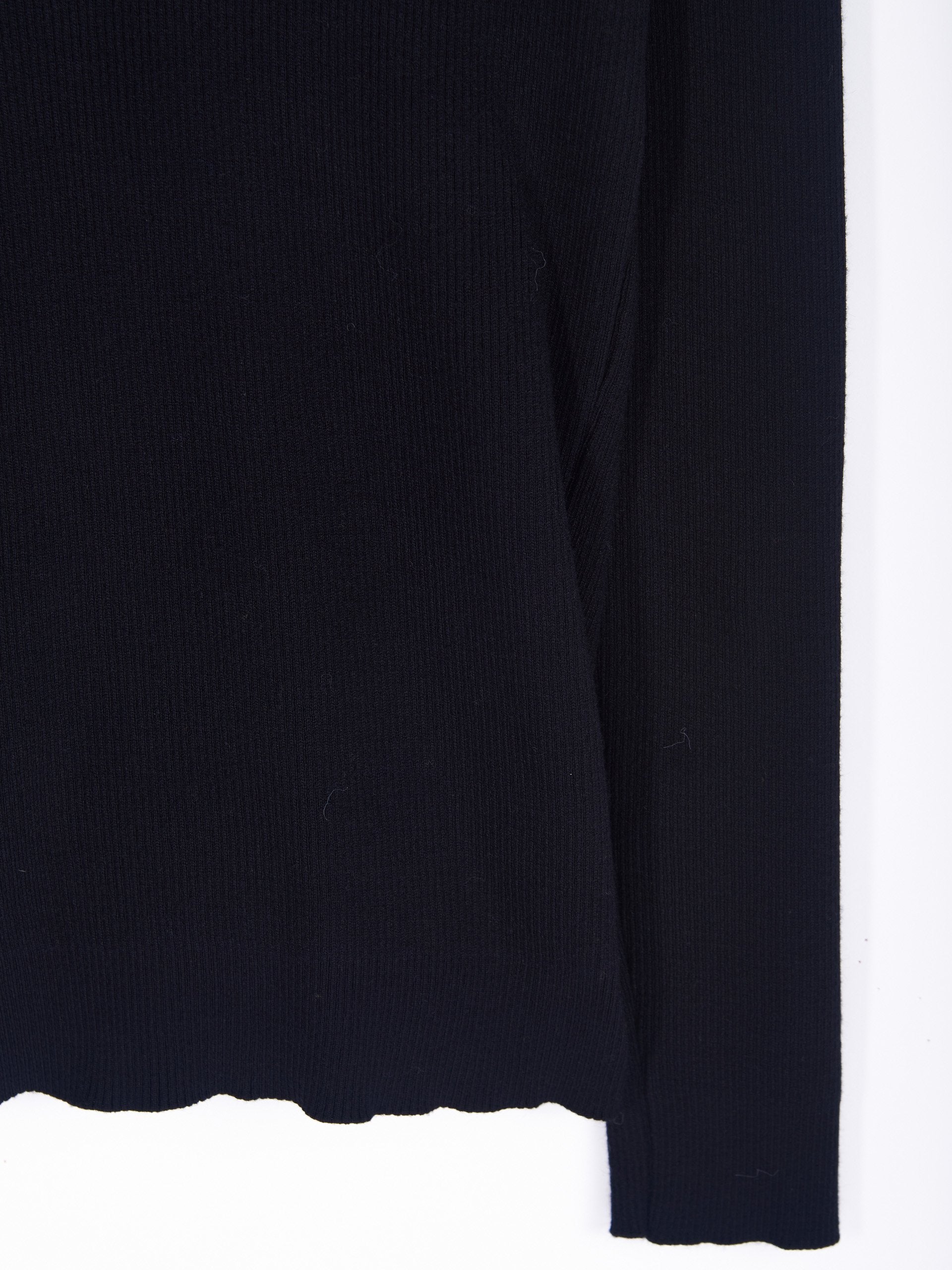 Maglia dolcevita a coste
