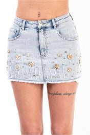Gonna denim con applicazioni