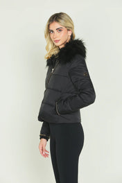 Piumino con catena nella zip