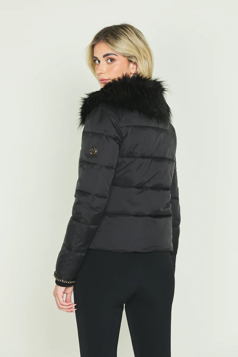 Piumino con catena nella zip