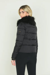 Piumino con catena nella zip