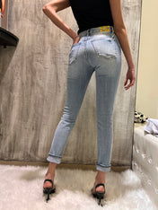 Jeans vita alta con strappi