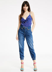 Jeans con borchie