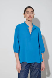 Blusa con manica a palloncino