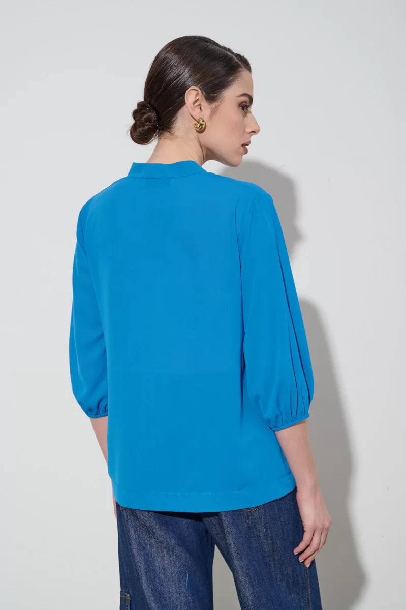 Blusa con manica a palloncino
