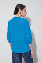 Blusa con manica a palloncino