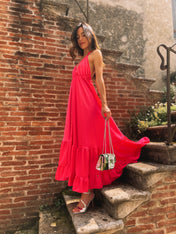 Abito lungo in raso con balze