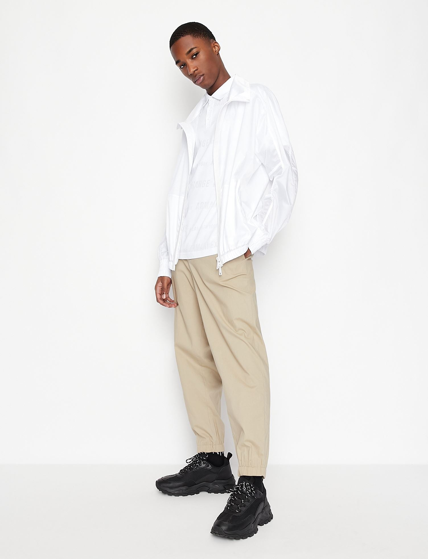 Polo con logo all over