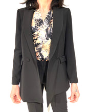 PANTALONI CON SPACCHETTO