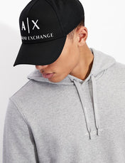 Cappello nero e bianco in cotone con visiera