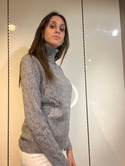 Maglioncino collo alto a trecce