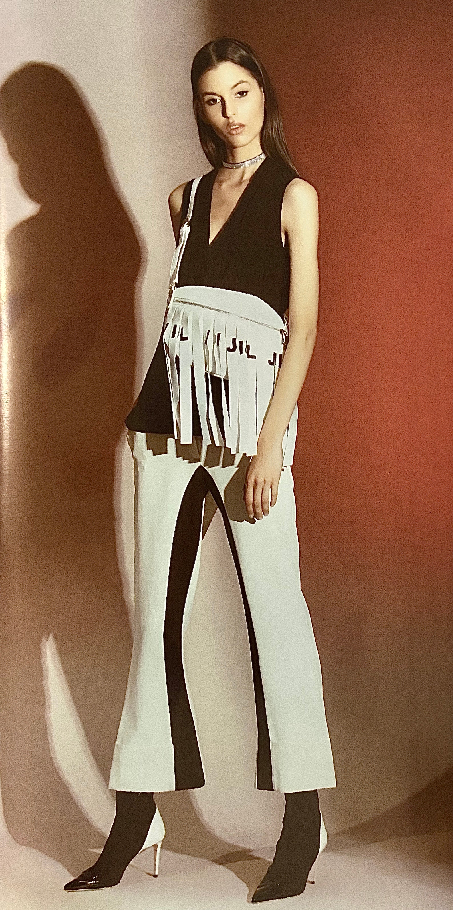 Pantalone a zampa bicolor con risvolto