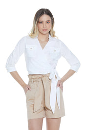 Blusa corta con taschini
