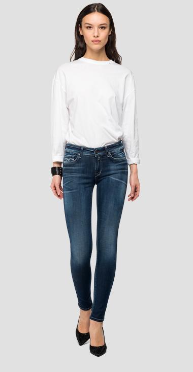 Jeans skinny vita alta con lavaggio
