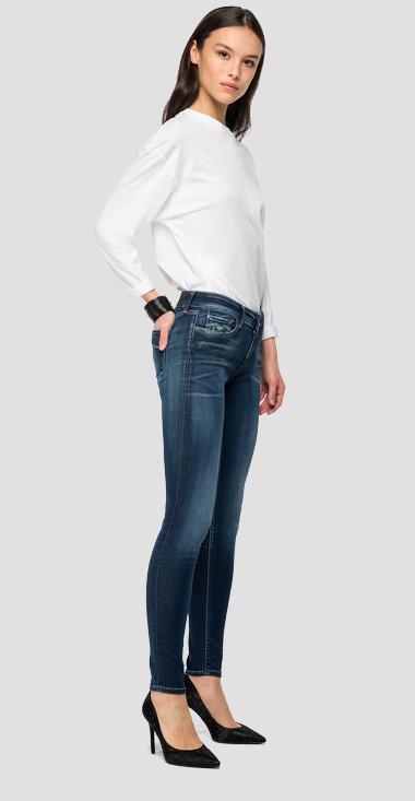 Jeans skinny vita alta con lavaggio