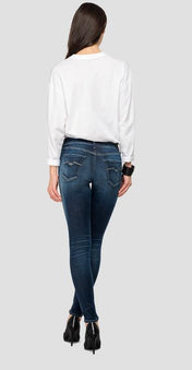 Jeans skinny vita alta con lavaggio