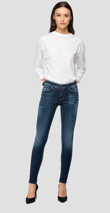 Jeans skinny vita alta con lavaggio