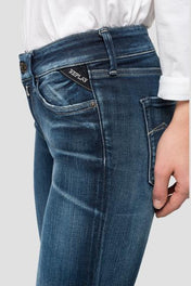 Jeans skinny vita alta con lavaggio