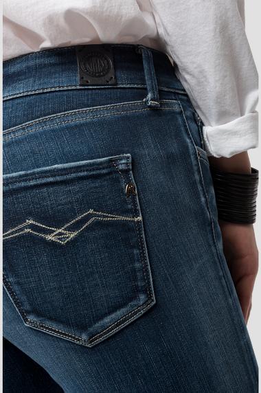 Jeans skinny vita alta con lavaggio