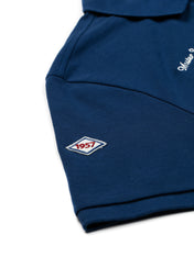 Polo in piquet con patch bluette