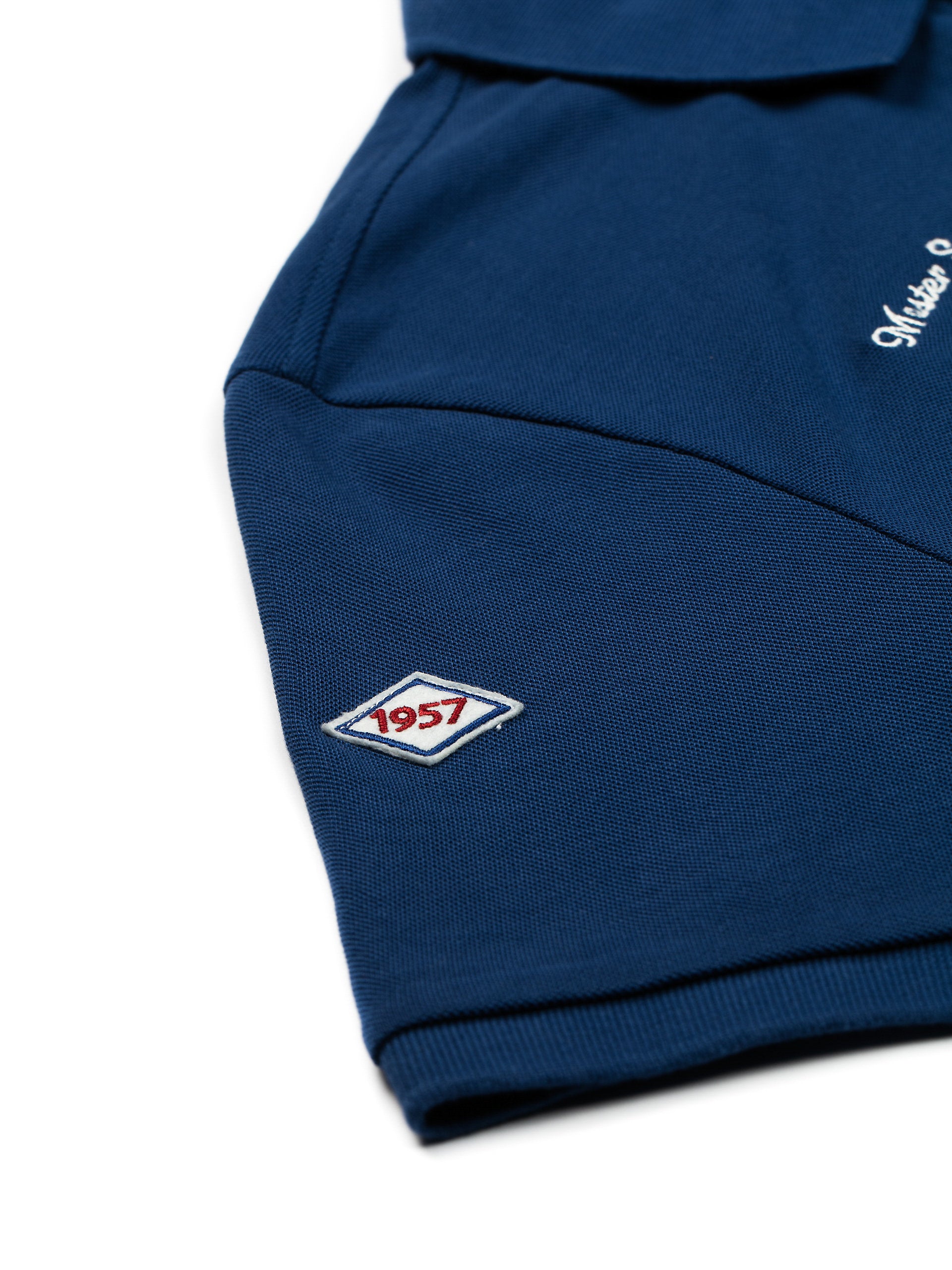 Polo in piquet con patch bluette
