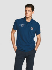 Polo in piquet con patch bluette