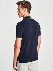 Polo stretch in piquet blu